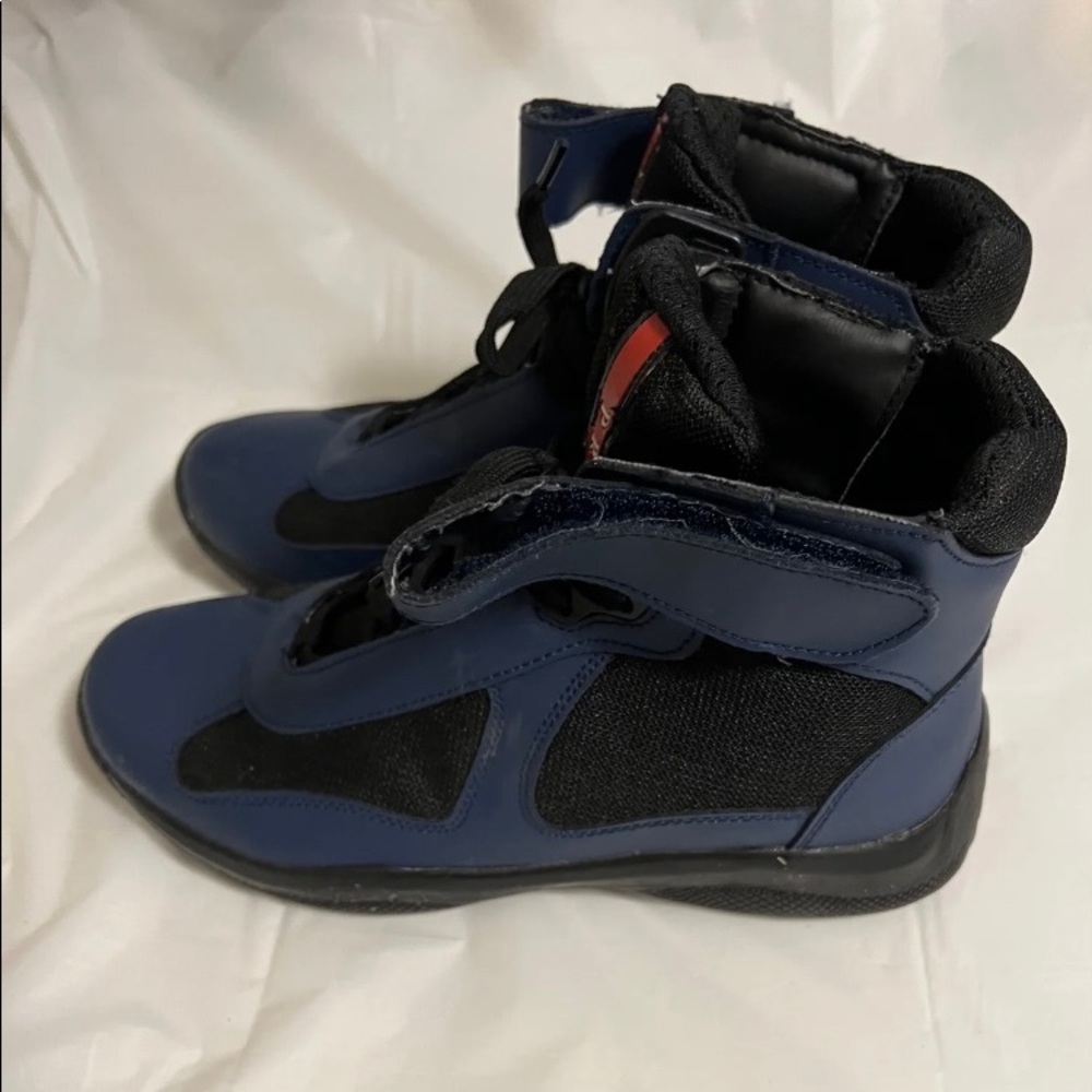 Navy blue and black leather Prada high tops